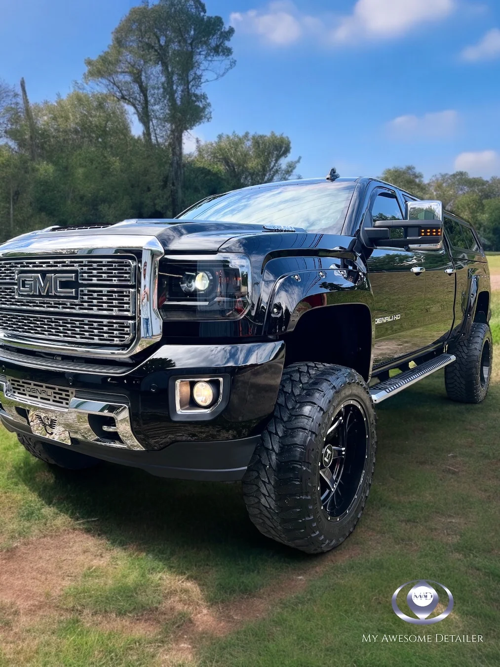 Black GMC Denali HD lifted