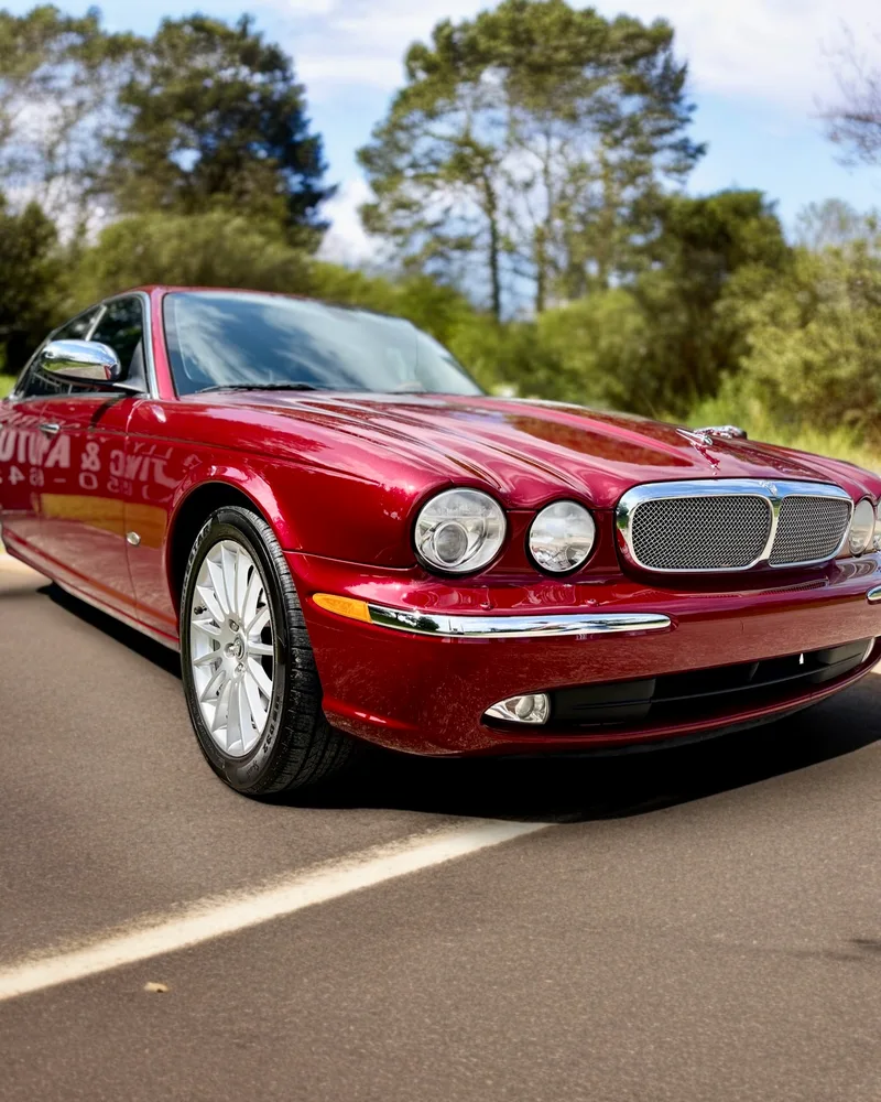 Red Jaguar XJ low angle ceramic coated