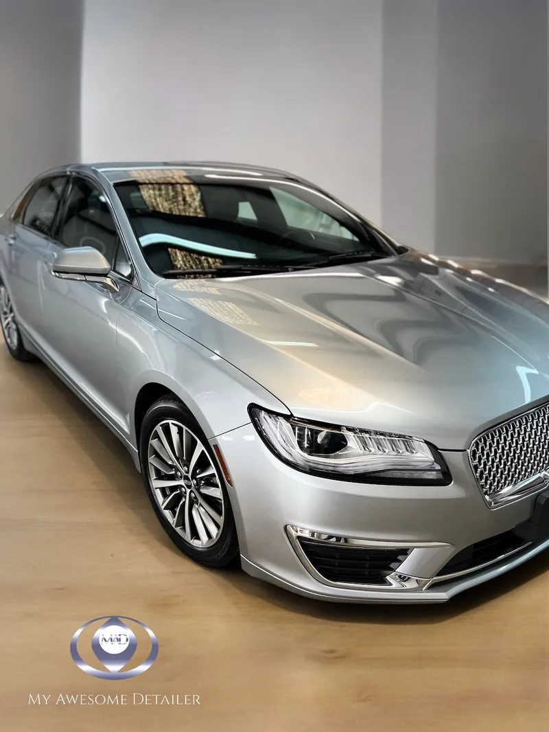 Silver Lincoln MKZ tinted driver side